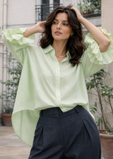 Almon green shirt with double ruffle sleeves