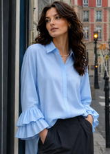 Blue shirt with double ruffle sleeves